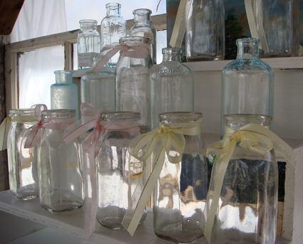Pretty pastel beribboned bottles