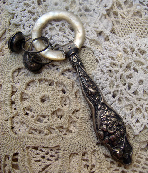 Antique mother of pearl and detailed sterling silver baby rattle from Kerry