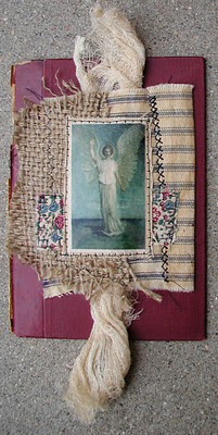Collage on a vintage book cover by KC Willis