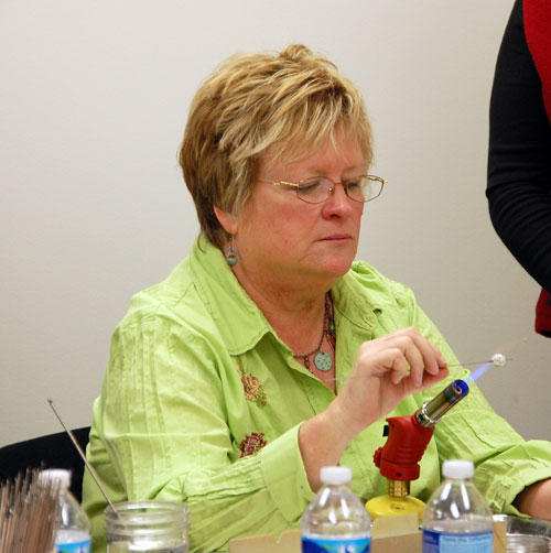 The master showing us how to enamel a bead